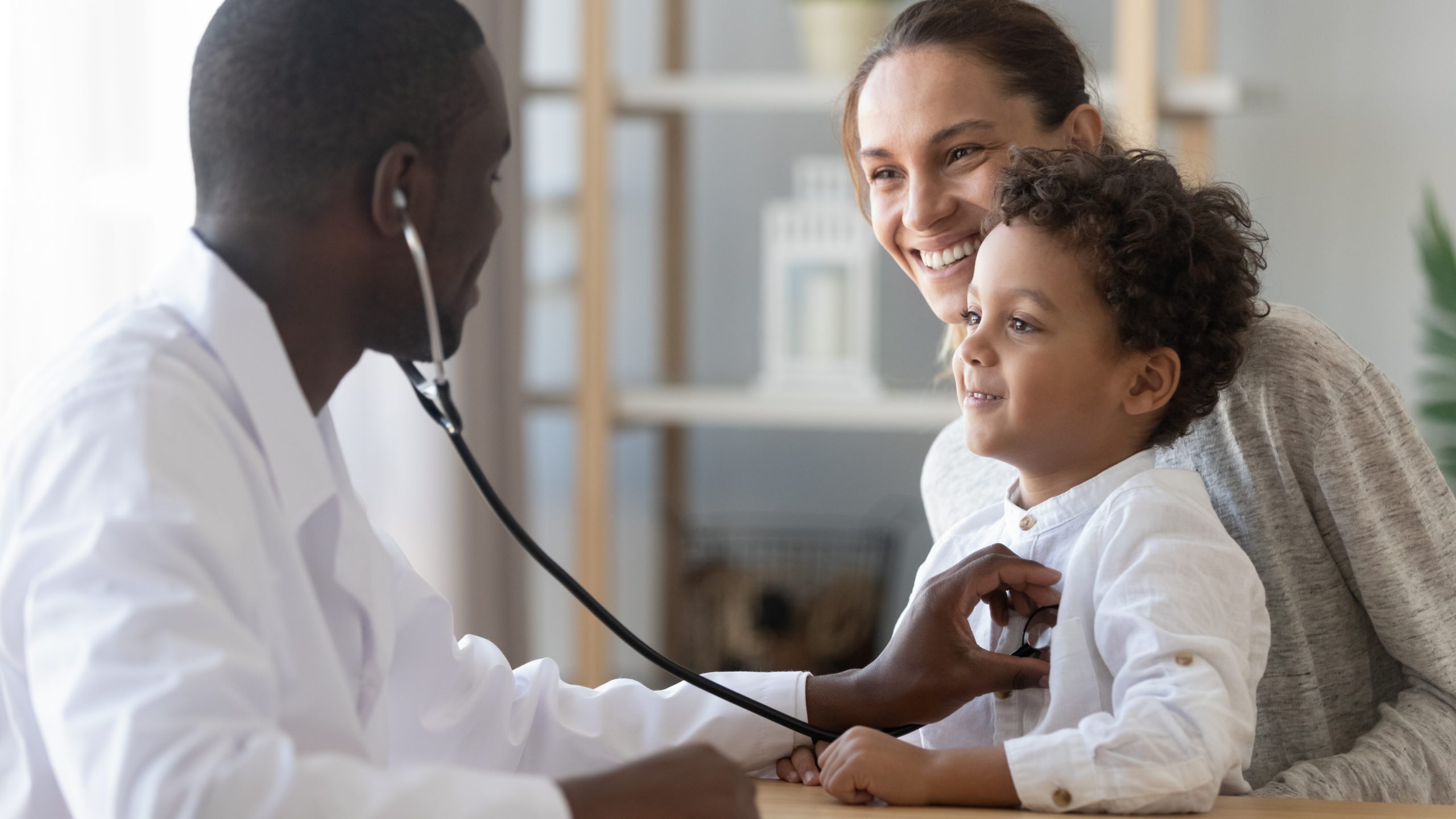 African,Male,Pediatrician,Hold,Stethoscope,Exam,Child,Boy,Patient,Visit